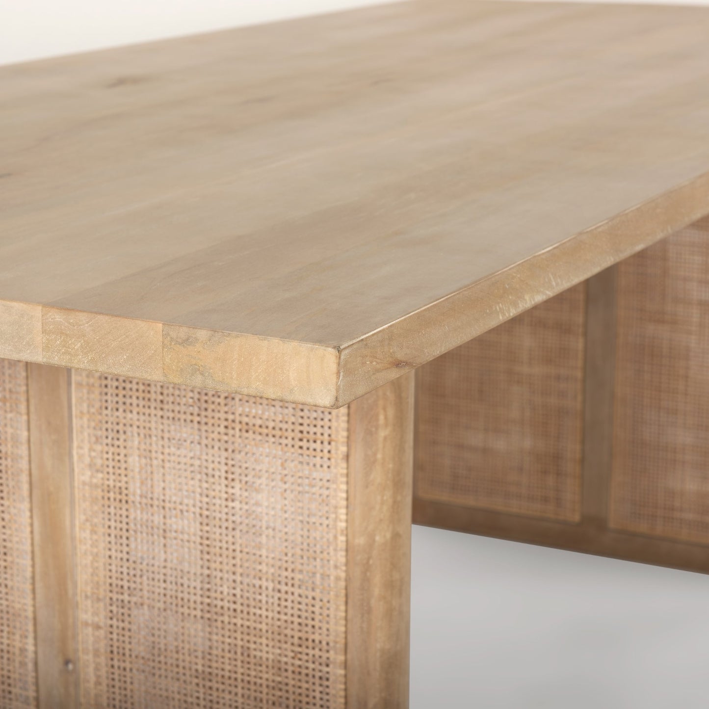 Grier 84" Light Brown Wood Dining Table with Cane Details