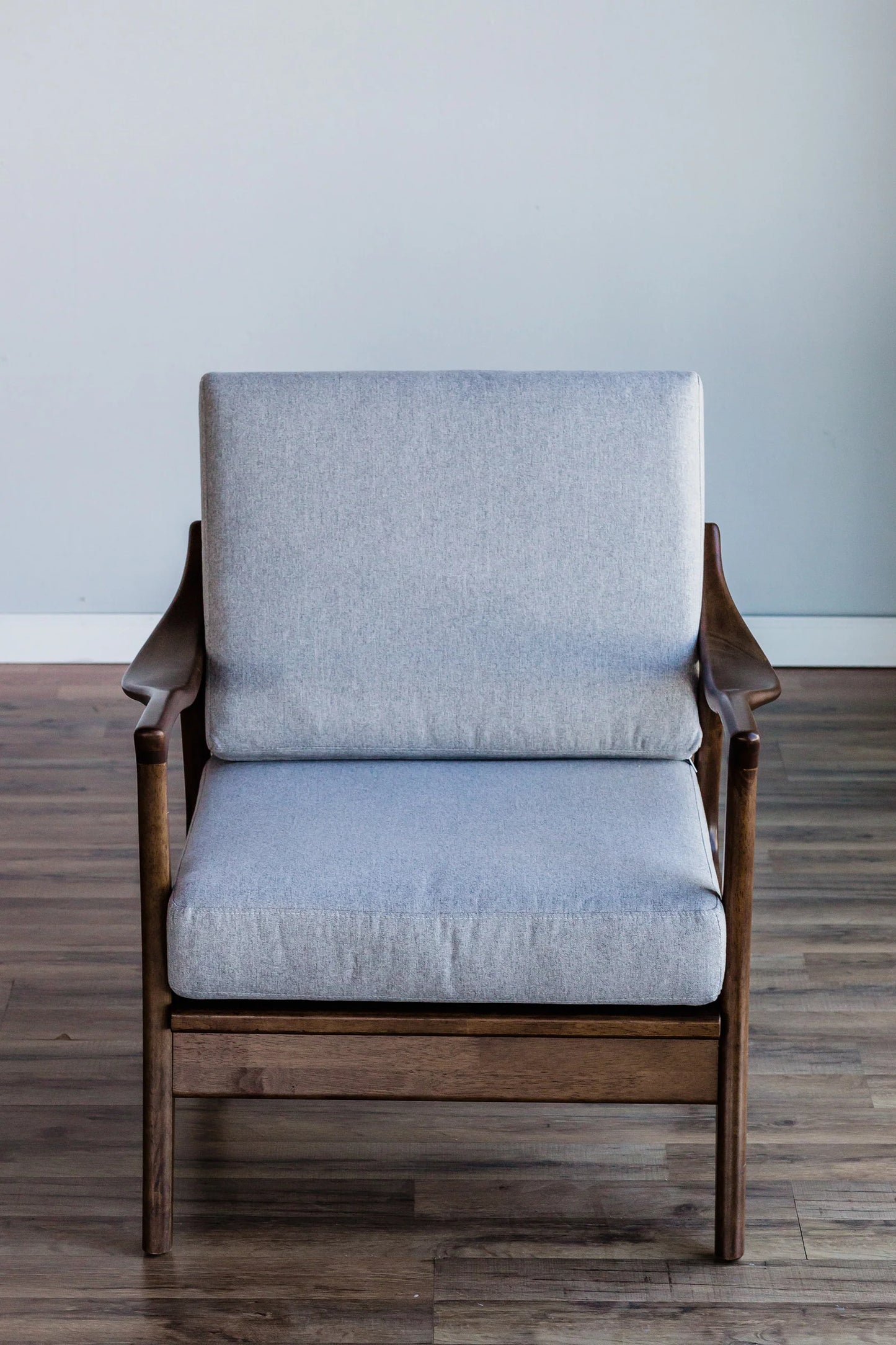 Zephyr Slate Lounge Chair – Stylish Light Gray Cushions with Removable Comfort, Featuring a Medium Brown Frame for a Modern Touch