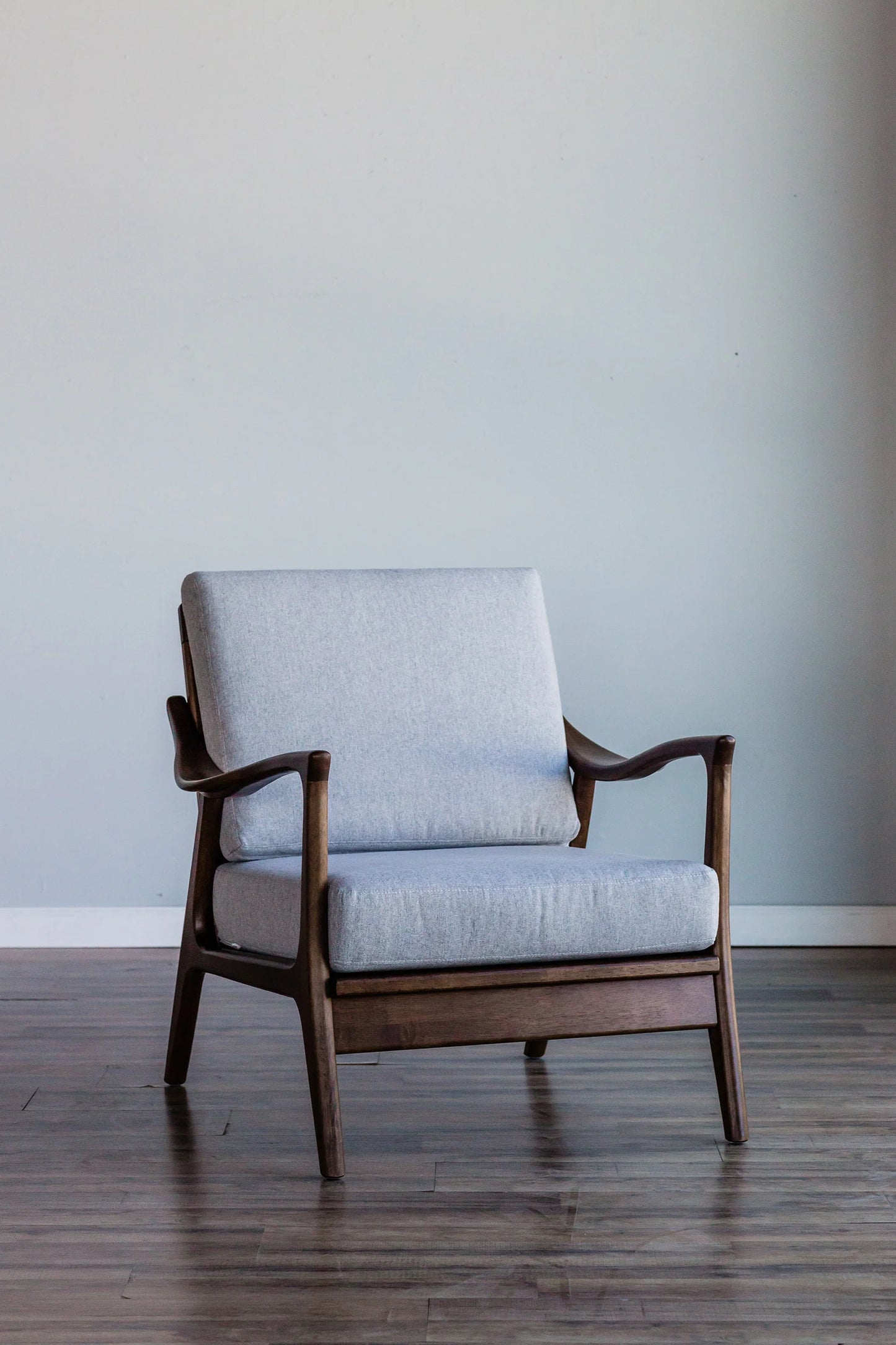 Zephyr Slate Lounge Chair – Stylish Light Gray Cushions with Removable Comfort, Featuring a Medium Brown Frame for a Modern Touch
