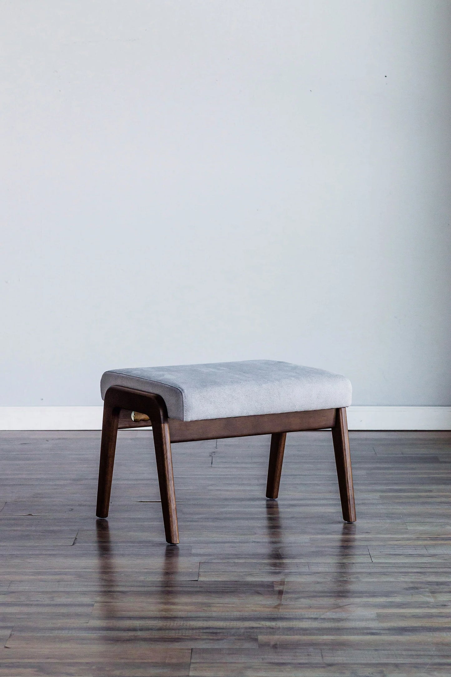 Zephyr Slate Footrest – Stylish Light Gray Upholstered Comfort with Medium Brown Frame, Perfect for Enhancing Any Room's Decor