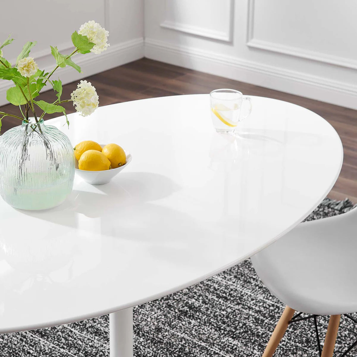 Lippa 60" Oval Wood Dining Table – Sleek Shape Perfect for Intimate Gatherings