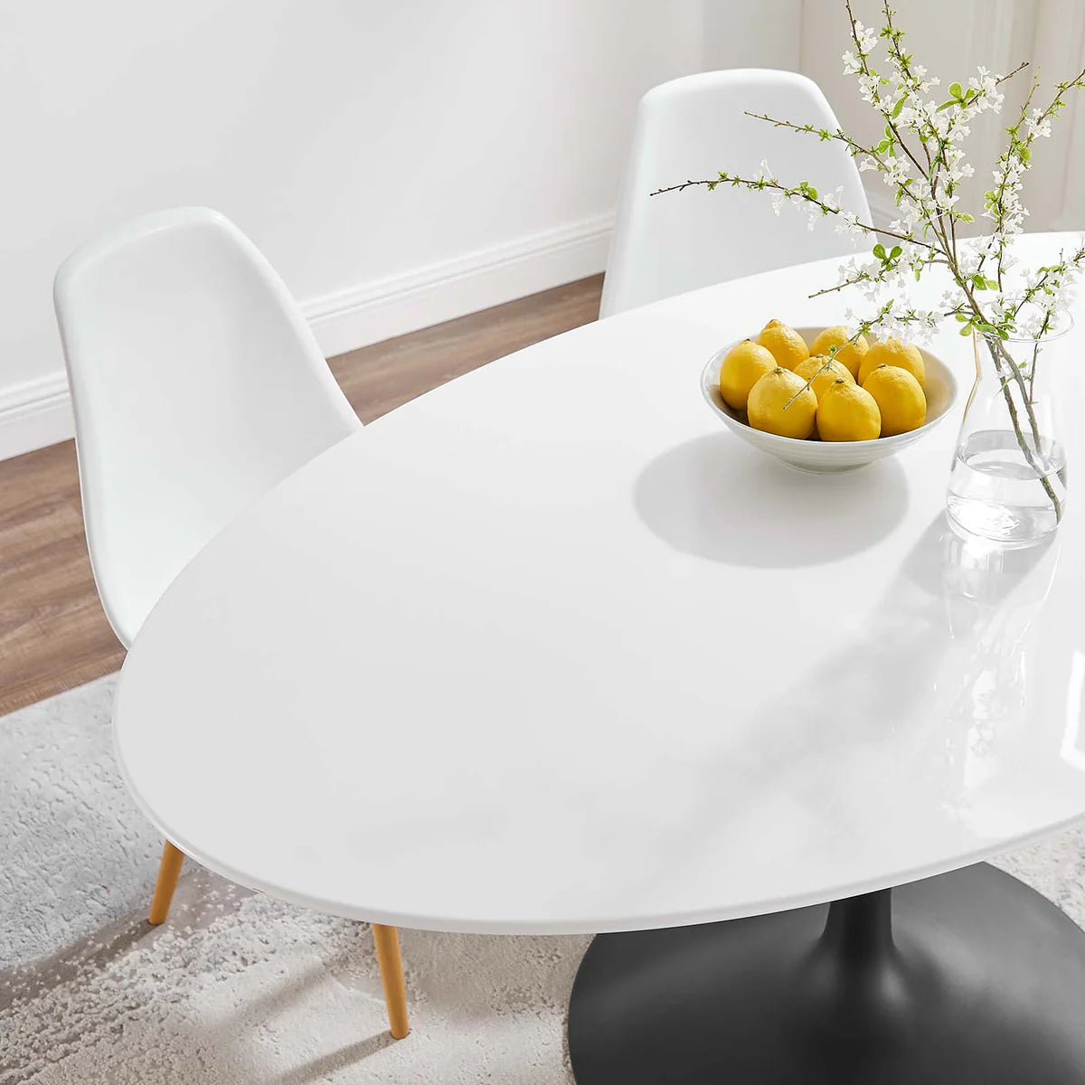 Lippa 60" Oval Wood Dining Table – Sleek Shape Perfect for Intimate Gatherings