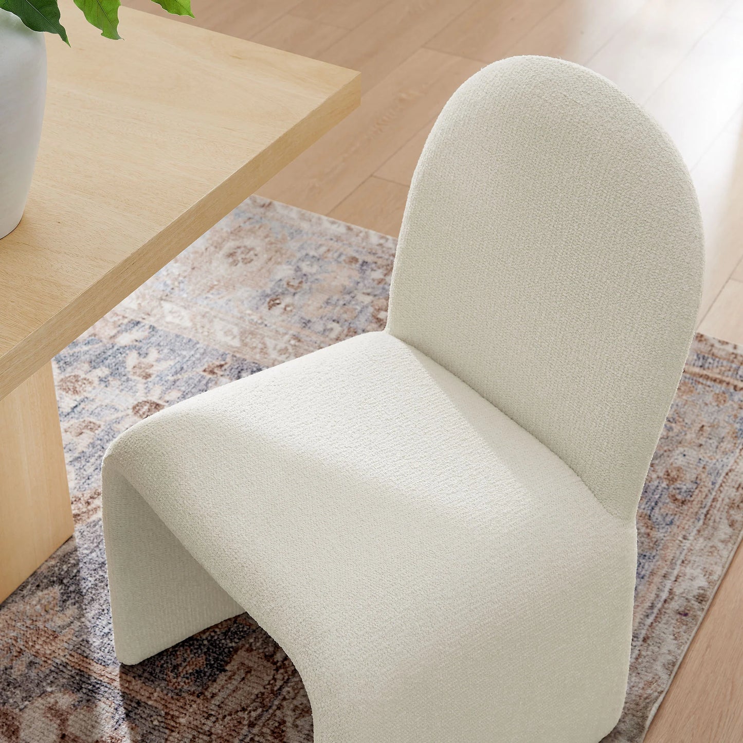 Junia Boucle Upholstered Arch Dining Chair – Soft and Stylish Armless Seating for Modern Dining Rooms
