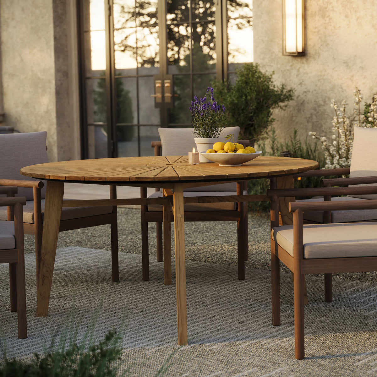 Cielo 59" Sunburst Outdoor Teak Dining Table in Natural