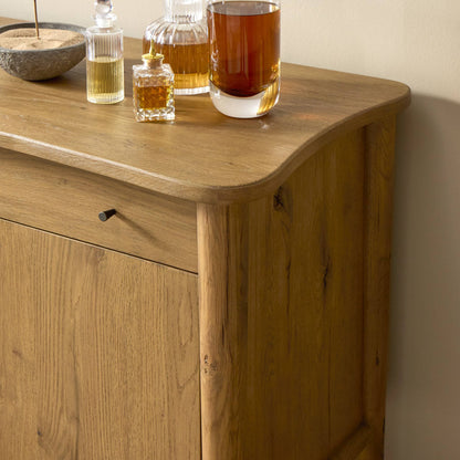 Weslin Three‑Drawer Drifted Oak Sideboard