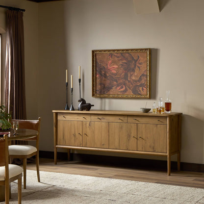 Weslin Three‑Drawer Drifted Oak Sideboard