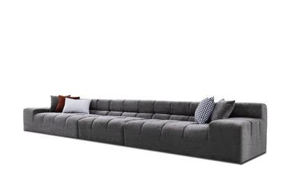 Divani Casa Rhonda Modern Grey Fabric 4-Seater Sofa - A Sleek and Spacious Design with Elegant Grey Upholstery, Perfect for Contemporary Living Spaces.