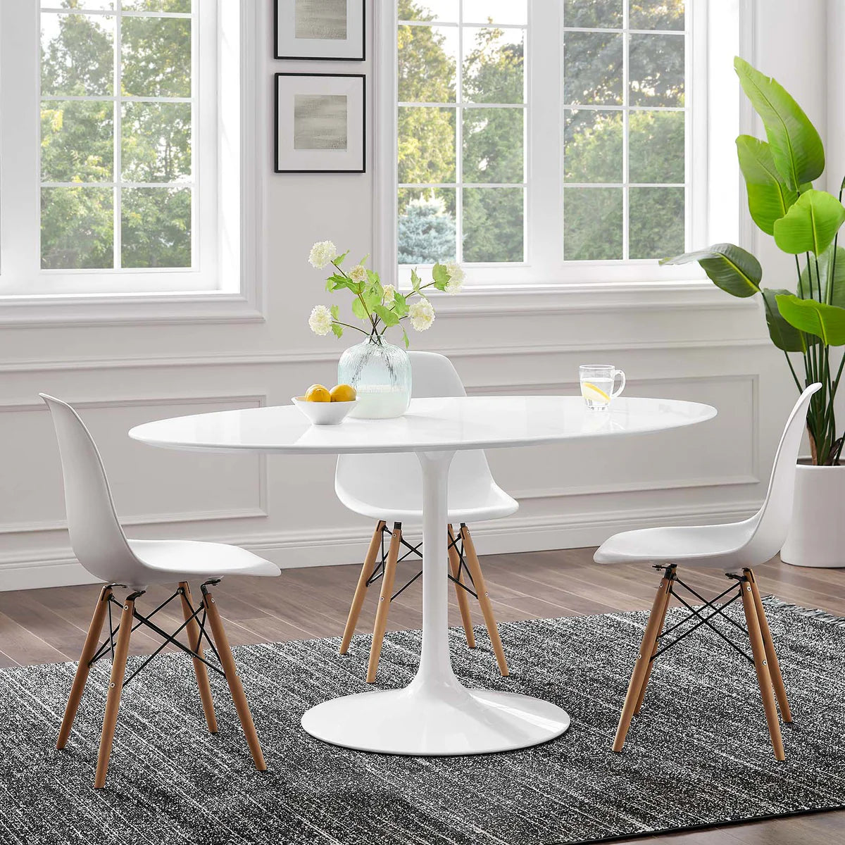 Lippa 60" Oval Wood Dining Table – Sleek Shape Perfect for Intimate Gatherings