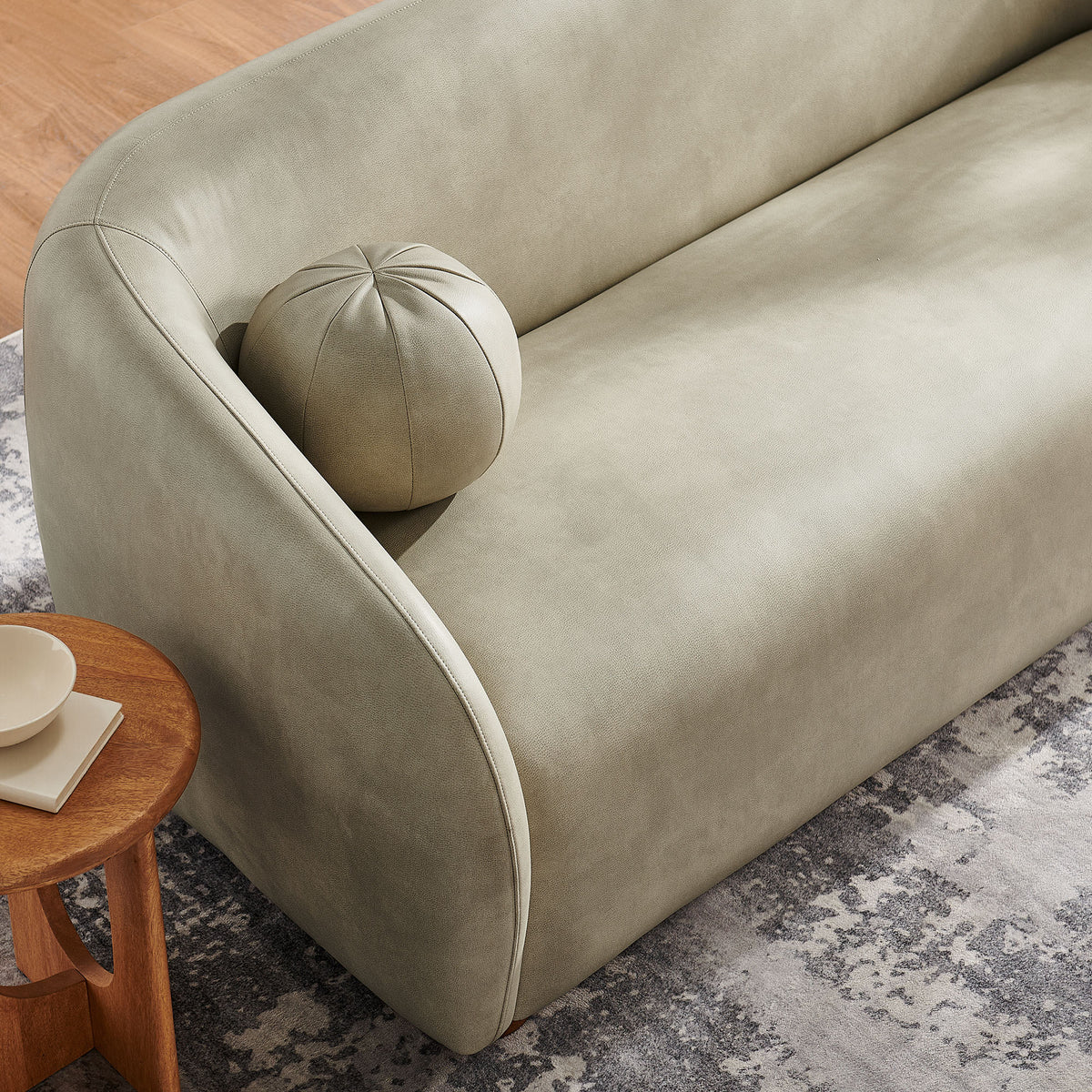 Holland 85 Inch Vegan Leather Curved Sofa