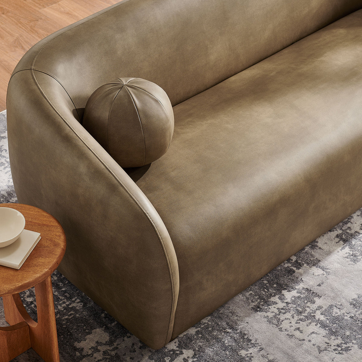 Holland 85 Inch Vegan Leather Curved Sofa