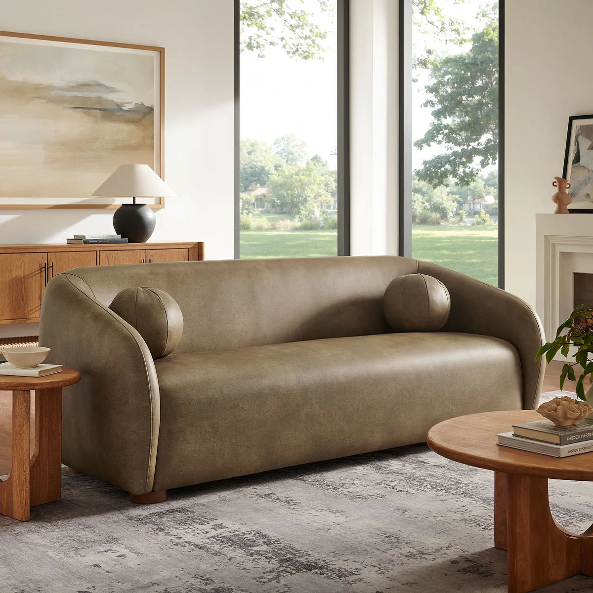 Holland 85 Inch Vegan Leather Curved Sofa