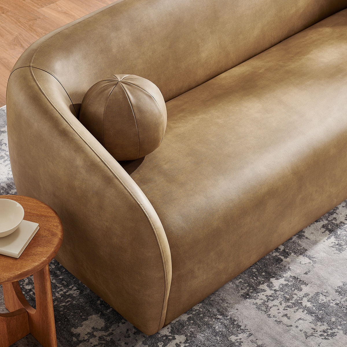 Holland 85 Inch Vegan Leather Curved Sofa