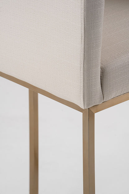 Modrest Yukon Modern Off White Fabric & Brushed Brass Counter Chair - A Chic and Comfortable Addition to Contemporary Spaces, Featuring Elegant Upholstery and Sleek Brushed Brass Accents.